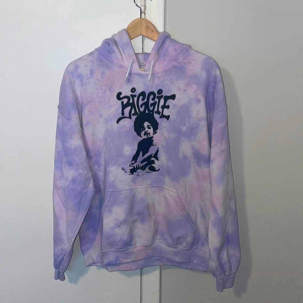 brand is The notorious B.I.G The size is L but it could fit like a medium